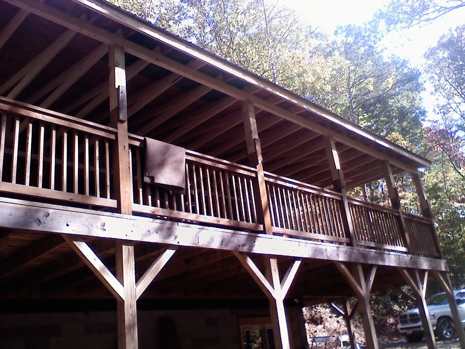 Timber framing under a new elevated porch and deck — Roof Leak Repair in Brandt by Roofing Brothers